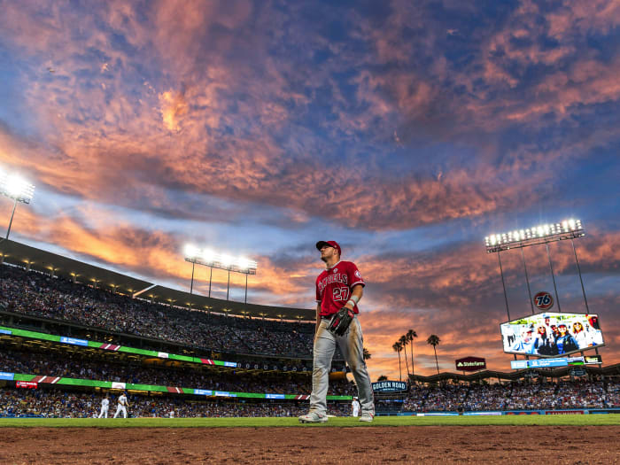 Mike Trout walking on a field